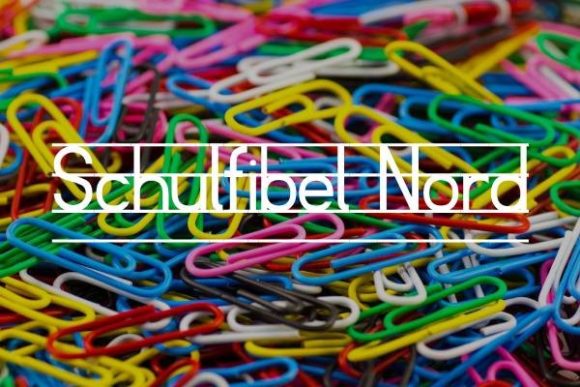 Schulfibel Nord Font: Playful Display Magic for Handmade Goods
